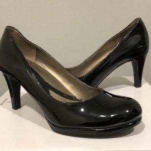 Naturalized patent leather heels
